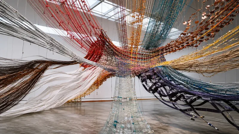 Distinct strands of flute wire, voice ribbon, reed fiber, percussion metal, tape and cable cross through one monumental loom while retaining their origins.